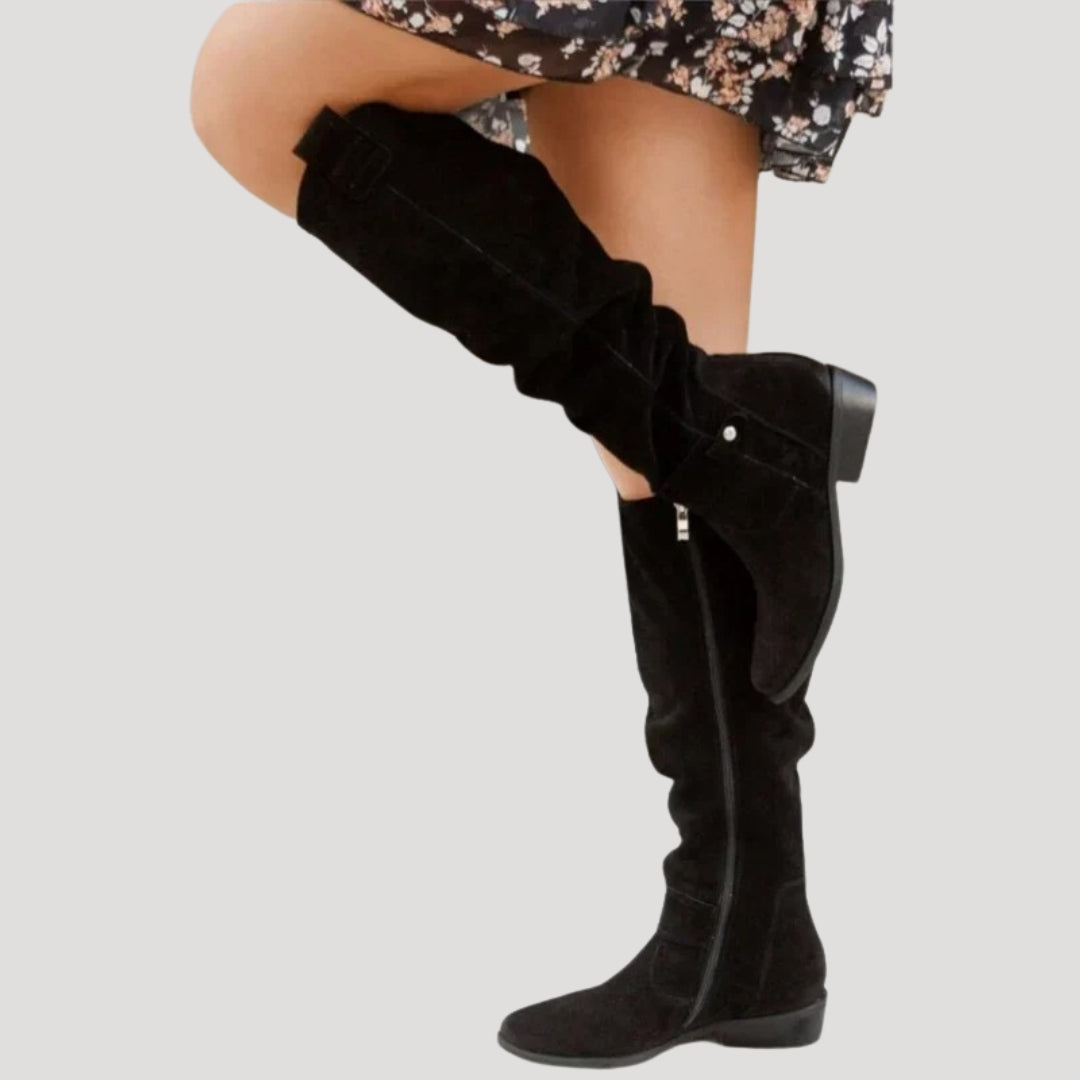 Women's knee-high suede leather boots with a low heel